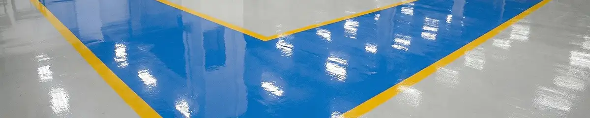 A factory floor professionally covered and marked with epoxy flooring in Anaheim, CA