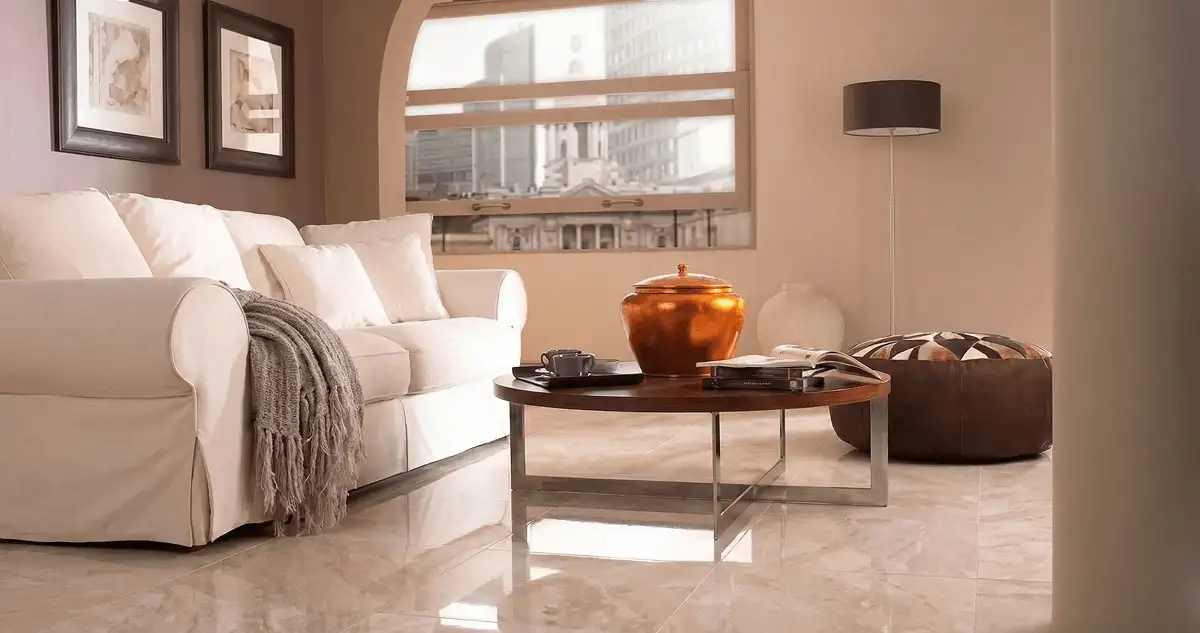Modern living room with professionally installed marble flooring, a beige sofa, coffee table in Anaheim, CA
